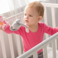tips to prevent your toddler from climbing out of the crib